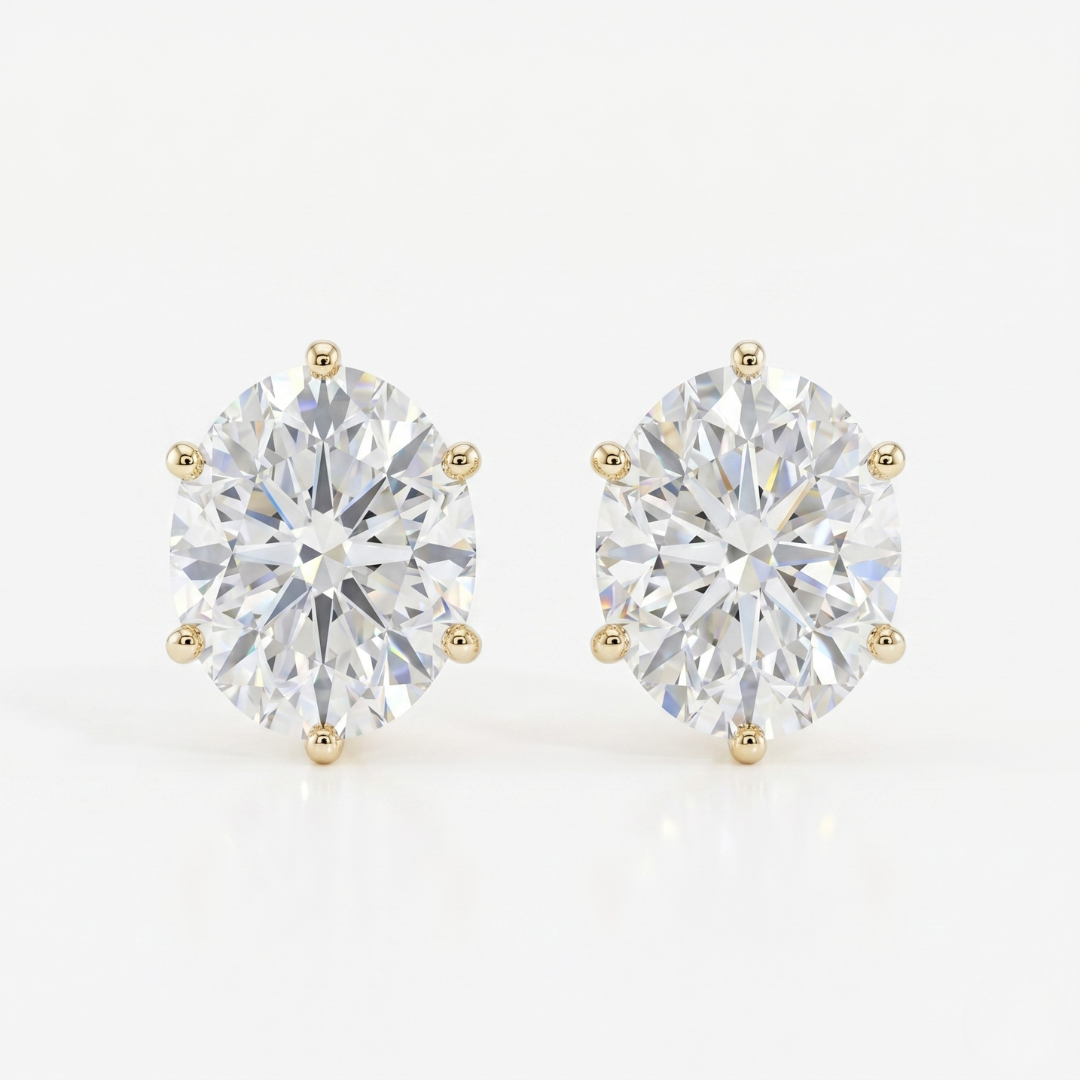 Oval solitaire studs - Lotus setting