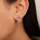 The Aura Whirl Studs