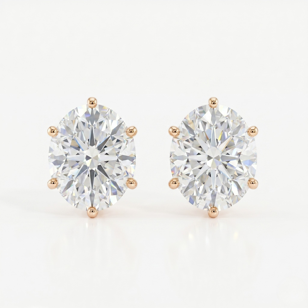 Oval solitaire studs - Lotus setting