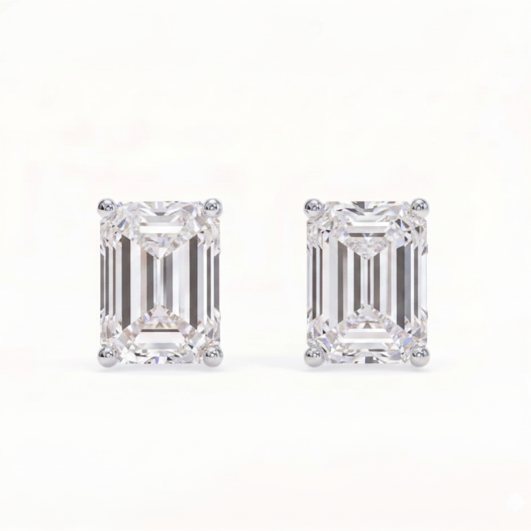Emerald solitaire studs - Crown setting