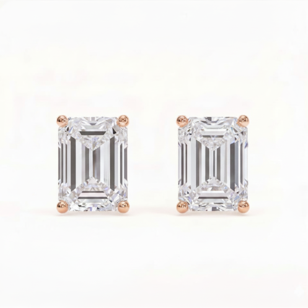 Emerald solitaire studs - Crown setting
