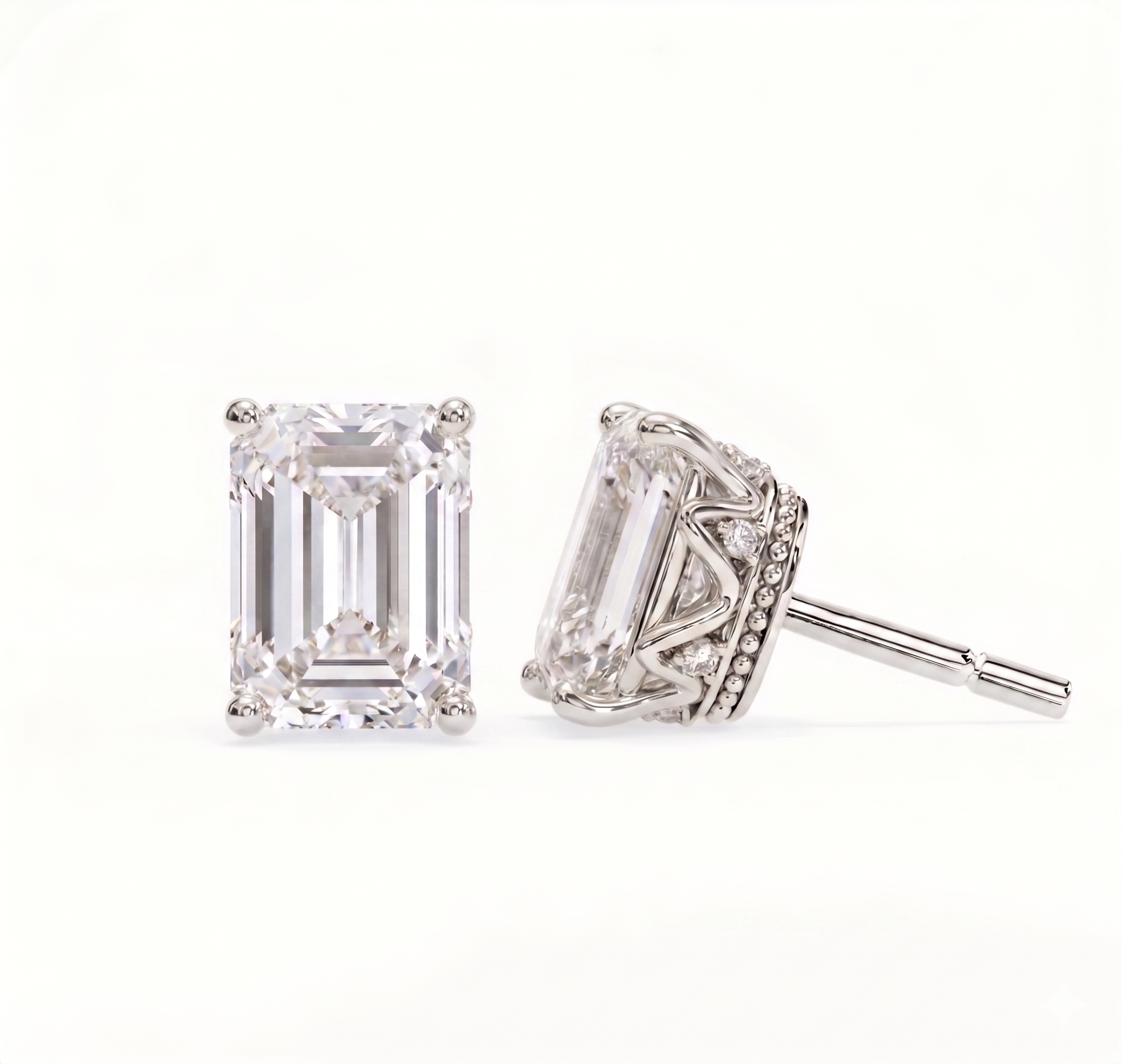 Emerald solitaire studs - Crown setting