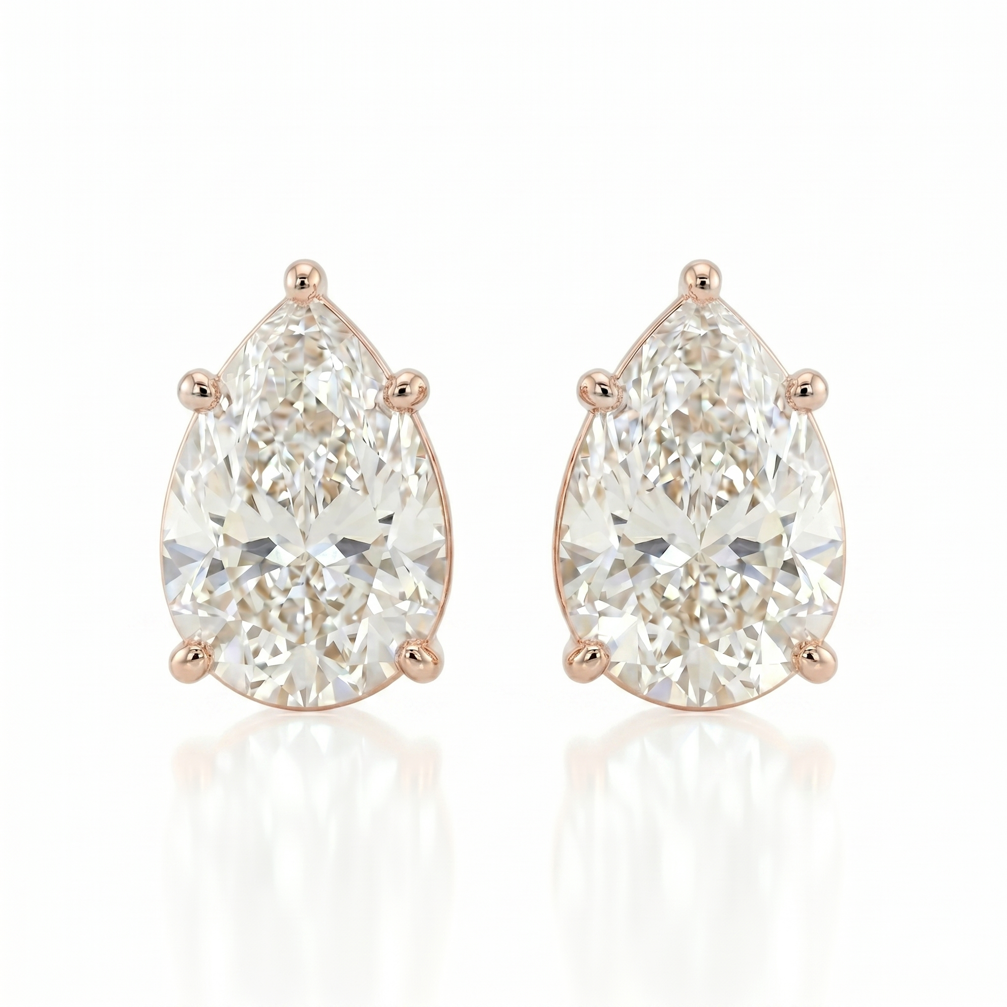 Pear solitaire studs - Lotus setting