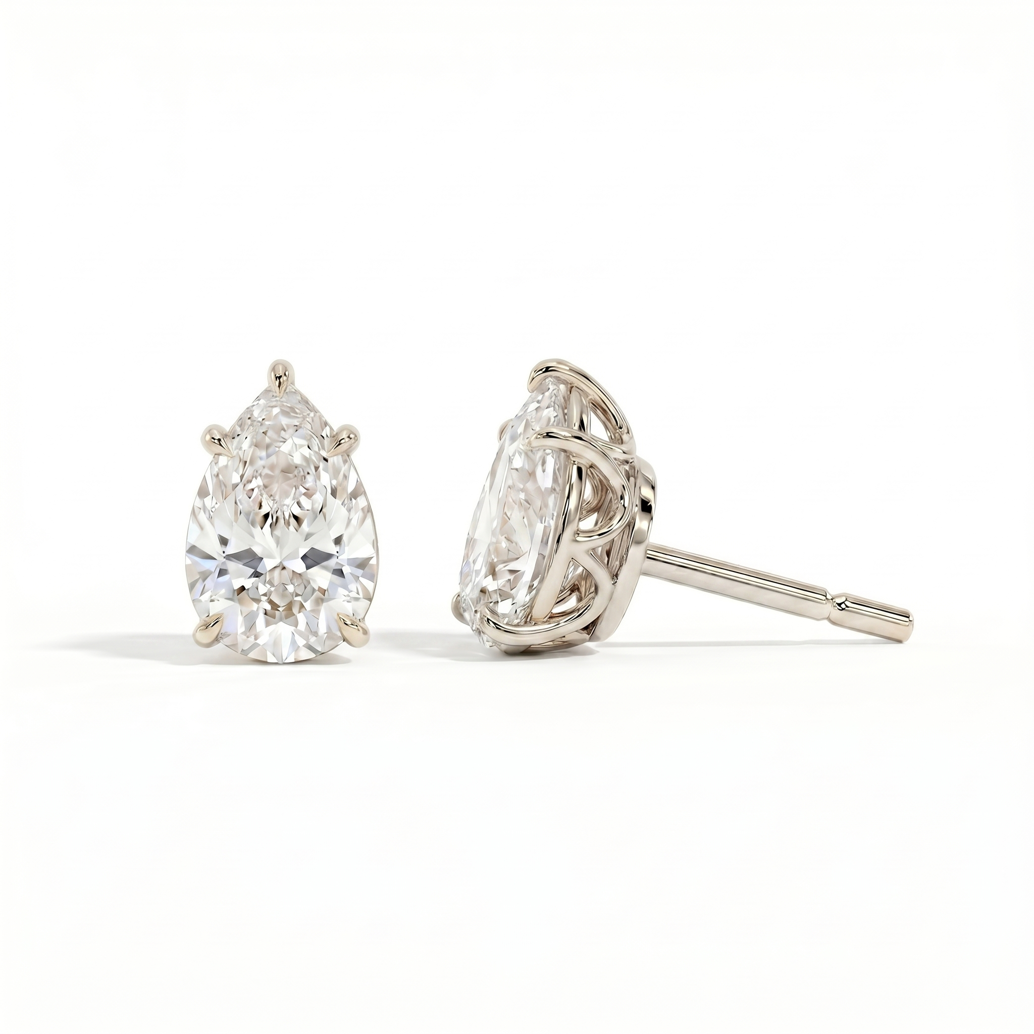 Pear solitaire studs - Lotus setting