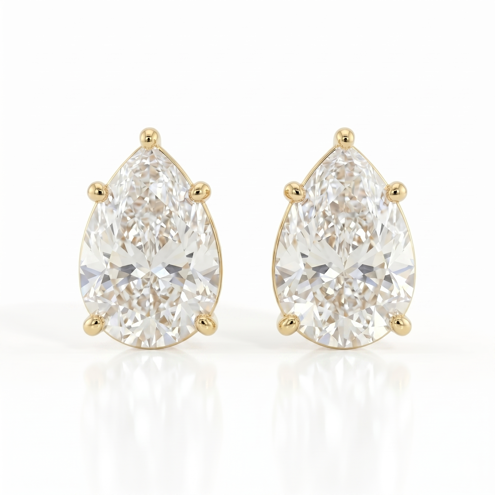Pear solitaire studs - Lotus setting