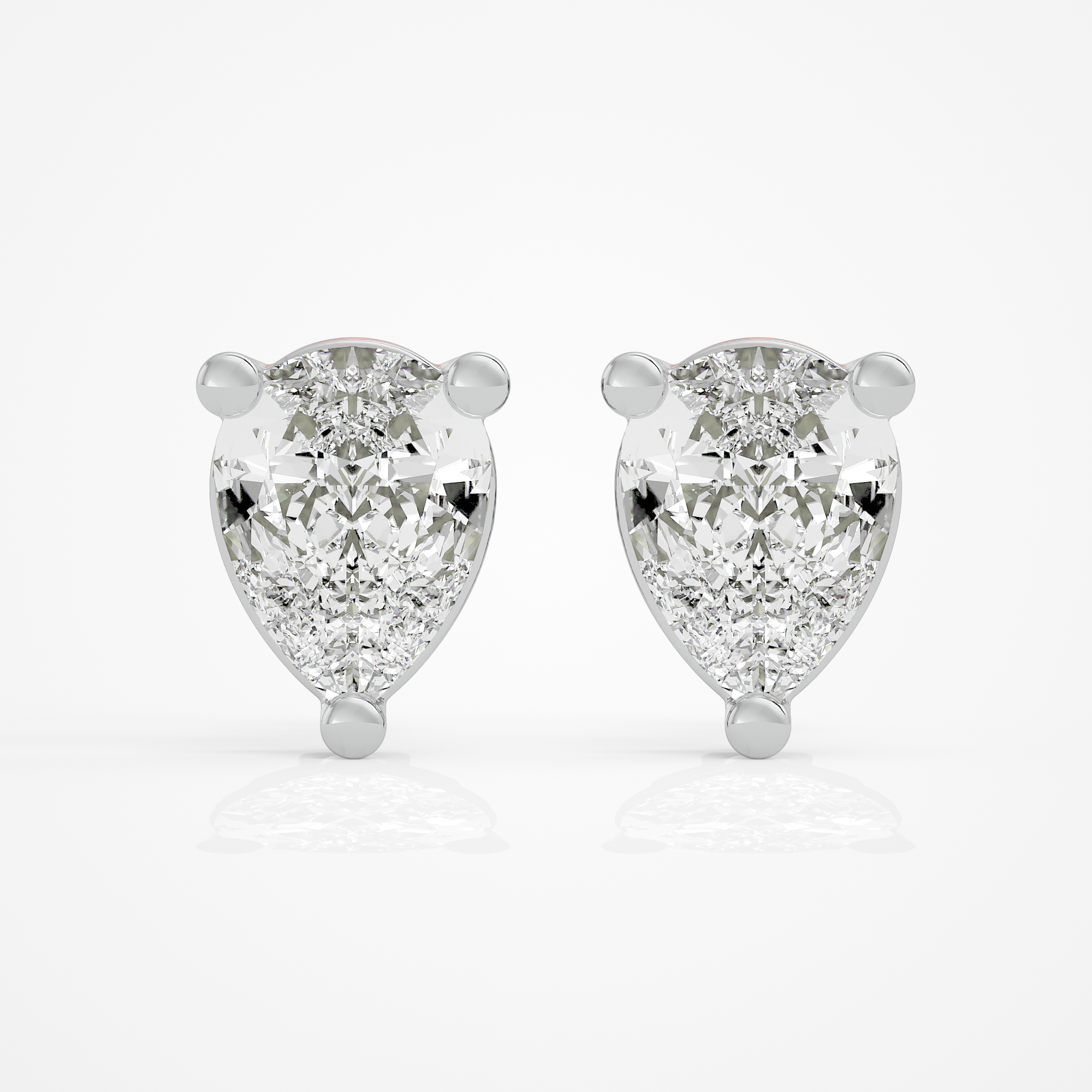 1 ct Pear Studs - Basket setting