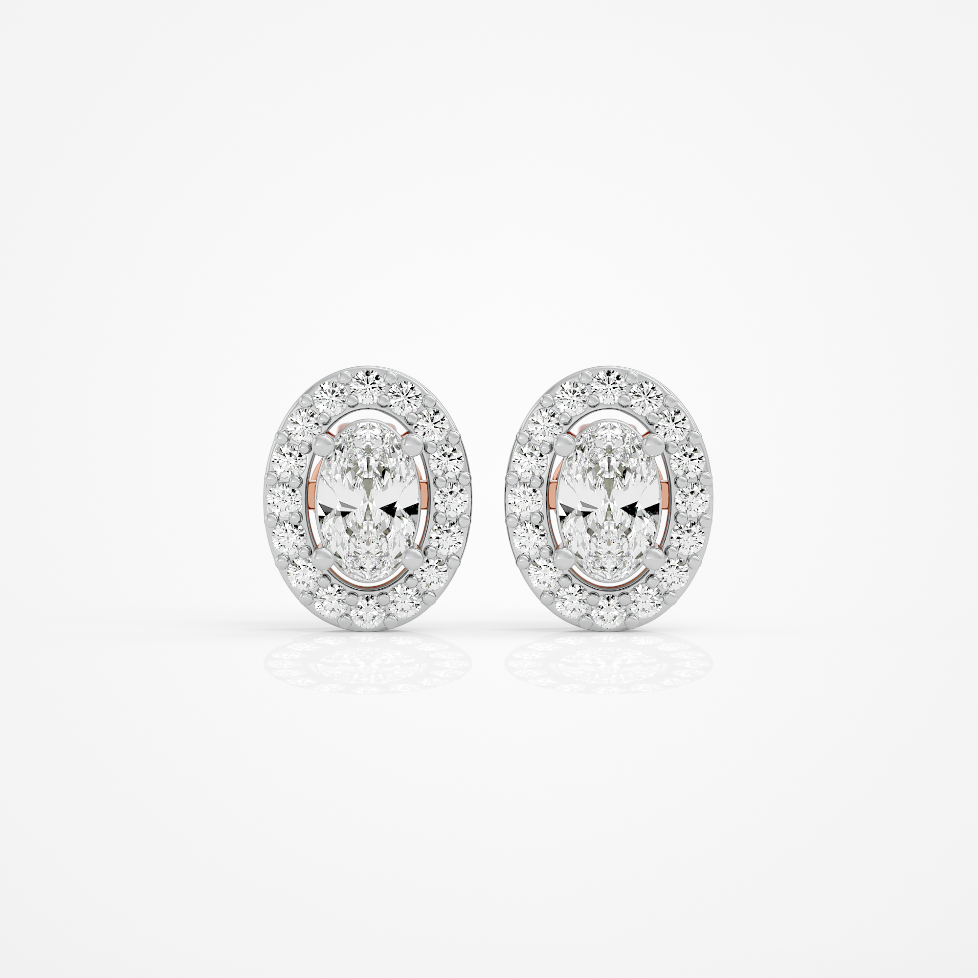 0.6 ct Oval studs with halo - Basket setting