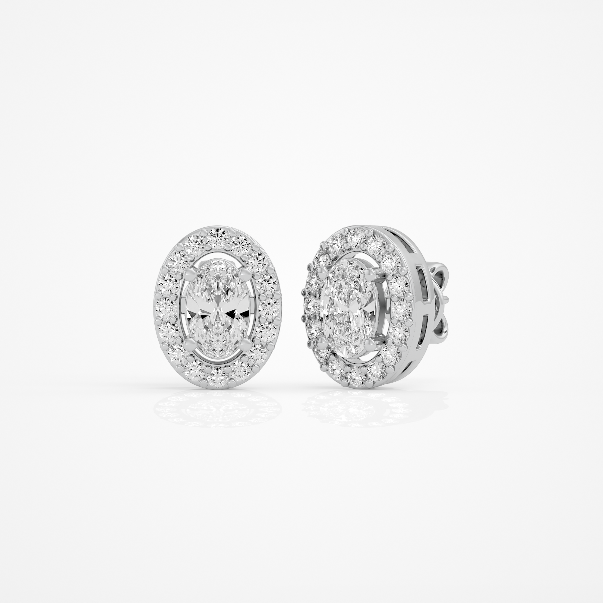 0.6 ct Oval studs with halo - Basket setting
