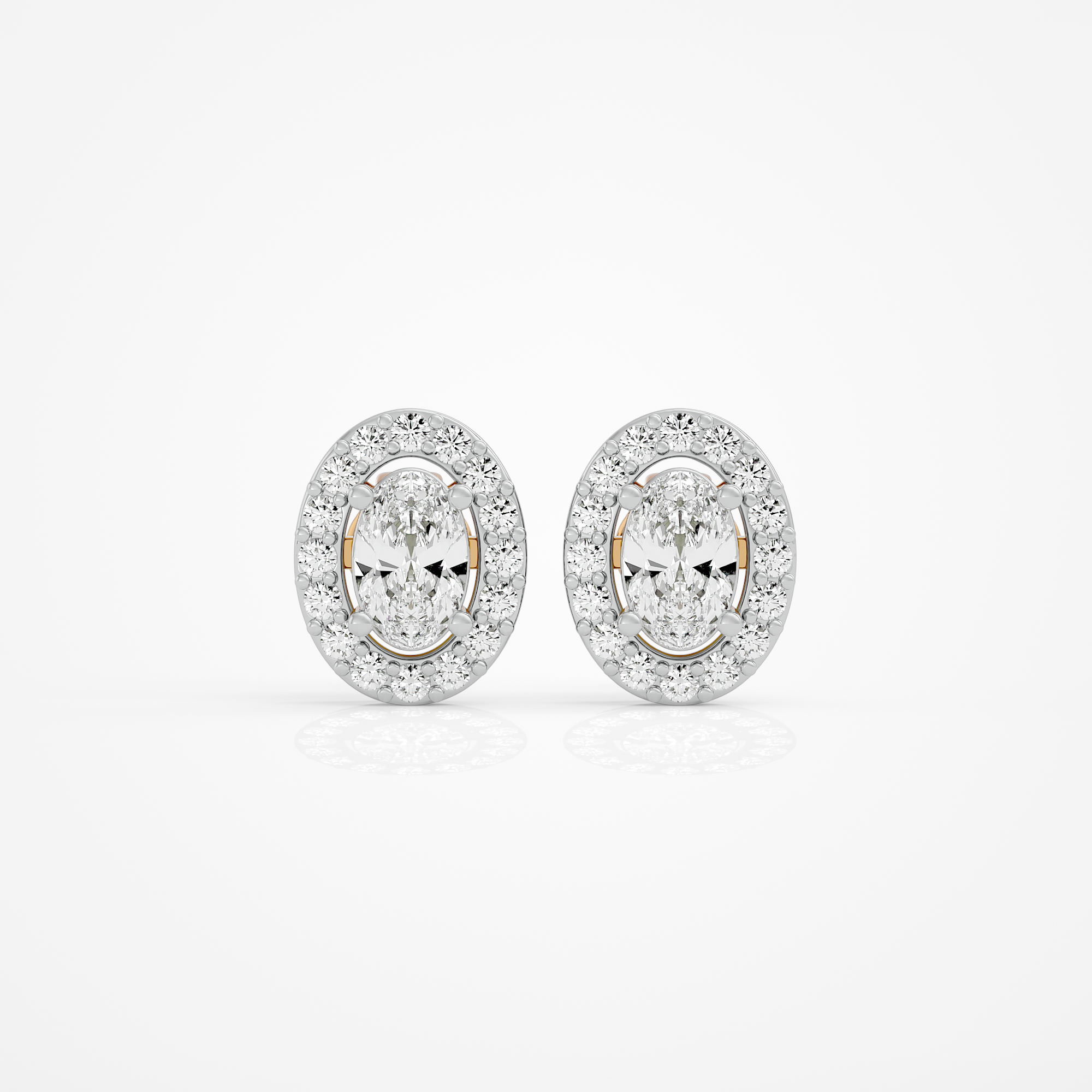 0.6 ct Oval studs with halo - Basket setting
