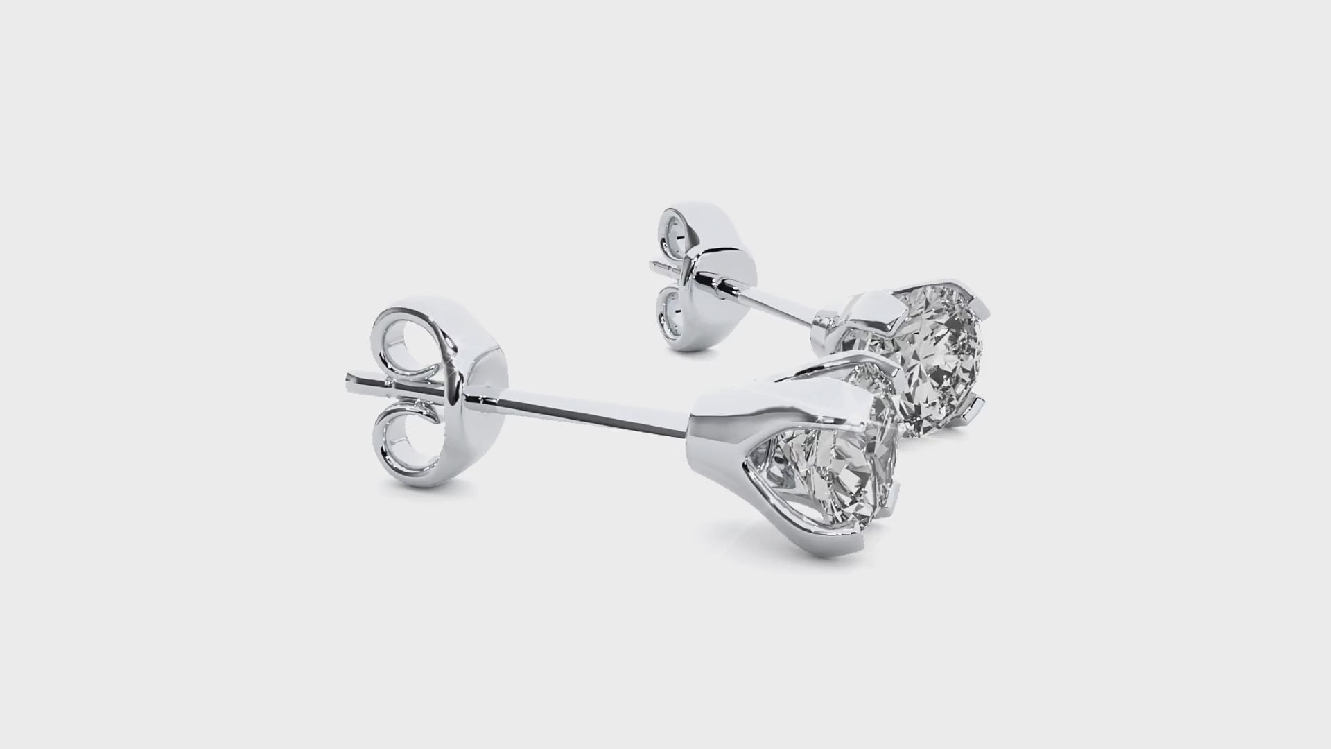 0.5 ct round studs - Martini setting